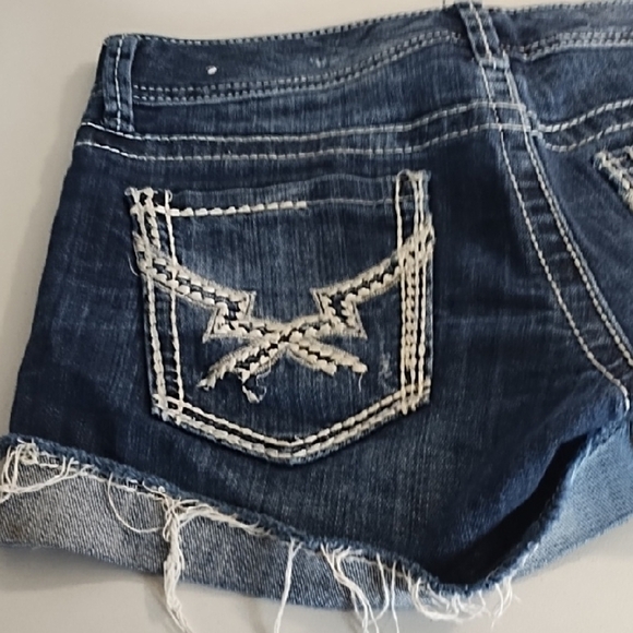 Dark Blue Jean Shorts with Frayed Cudded Hem and Decorative Stitching - Picture 6 of 15